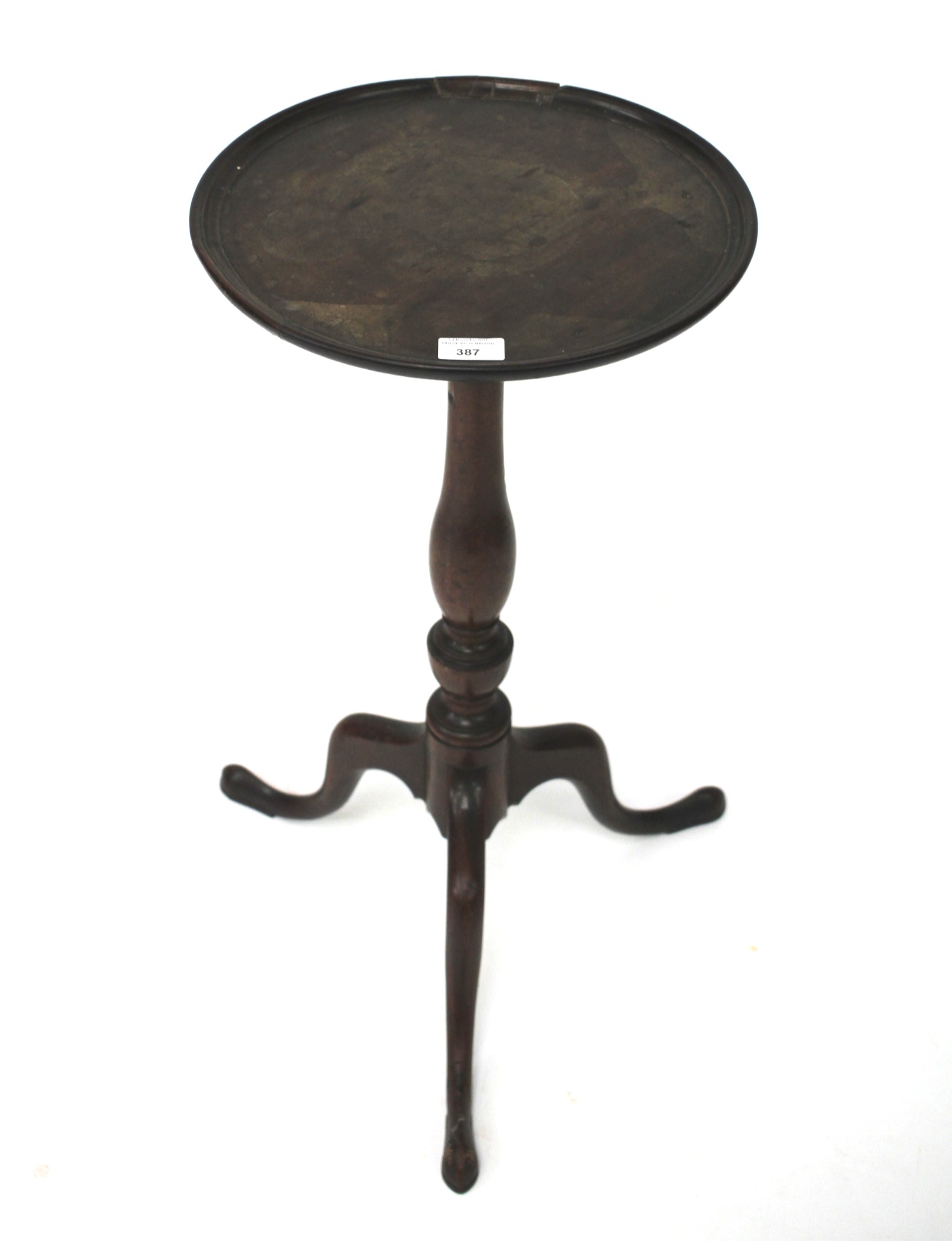 A mahogany wine table of circular form. Raised on tripod support, (repairs to galleried top).