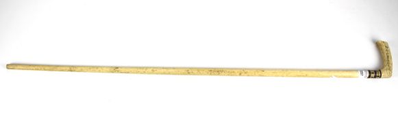 A bone walking stick. Inscribed to the handle 'J.
