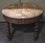 A 20th century oak wind out table.