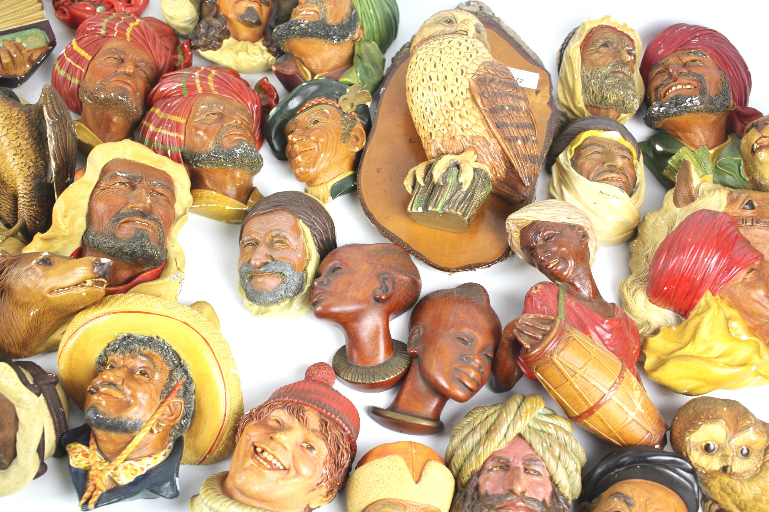 A collection of wall masks. - Image 2 of 3