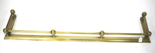 A 20th century brass Victorian style fender.