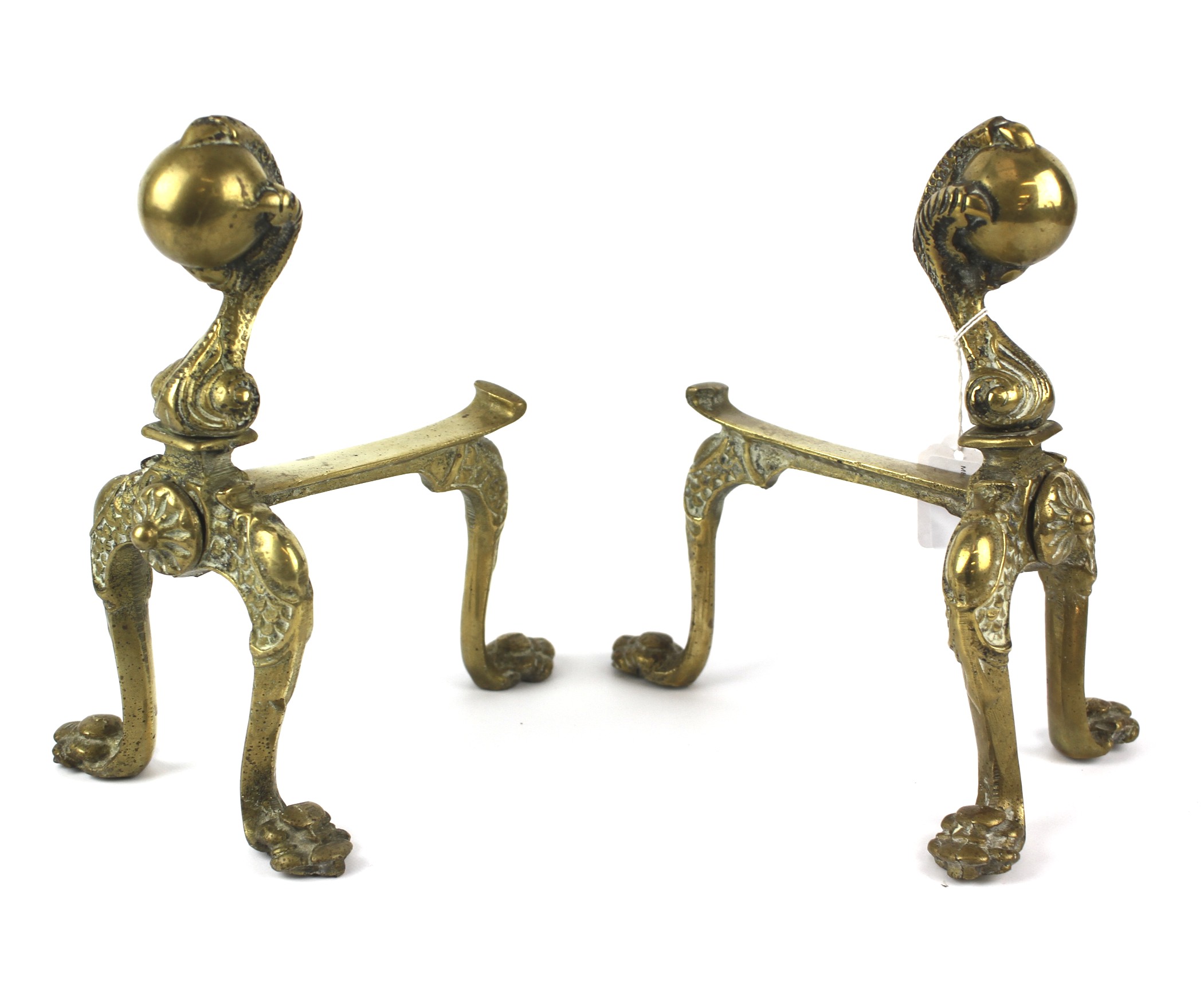 A pair of brass claw and ball fire dogs.