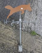 A contemporary cast metal weather vane.
