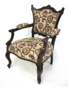 A 1880s mahogany elbow chair.
