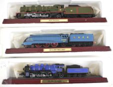 Three cased collectors' tenders and locomotives models.