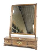 An early 19th century mahogany dressing table mirror.