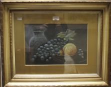 J Walllace (early 20th Century School), a still life depicting grapes, fruit and a jug.