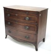 A 19th century inlaid mahogany bow fronted chest of drawers.