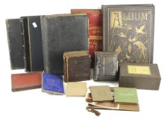 A collection of 19th-20th century photograph albums and negatives.