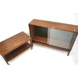 A teak sideboard and a two tiered push-along trolley.
