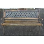 A wooden garden bench. With metal effect wood back and metal end supports.