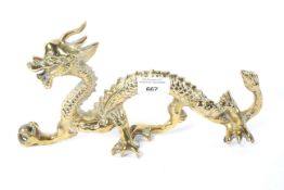 A Chinese brass model of a dragon.
