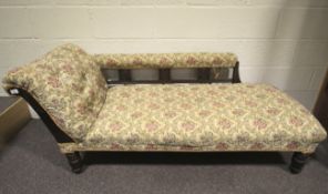 An early 20th century chaise longue.