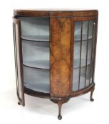 A walnut Art Deco style display cabinet.