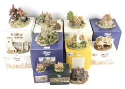 A collection of Lilliput Lane cottages.