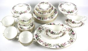 A Wedgwood part dinner-service with eight settings in the 'Hathaway Rose' pattern.