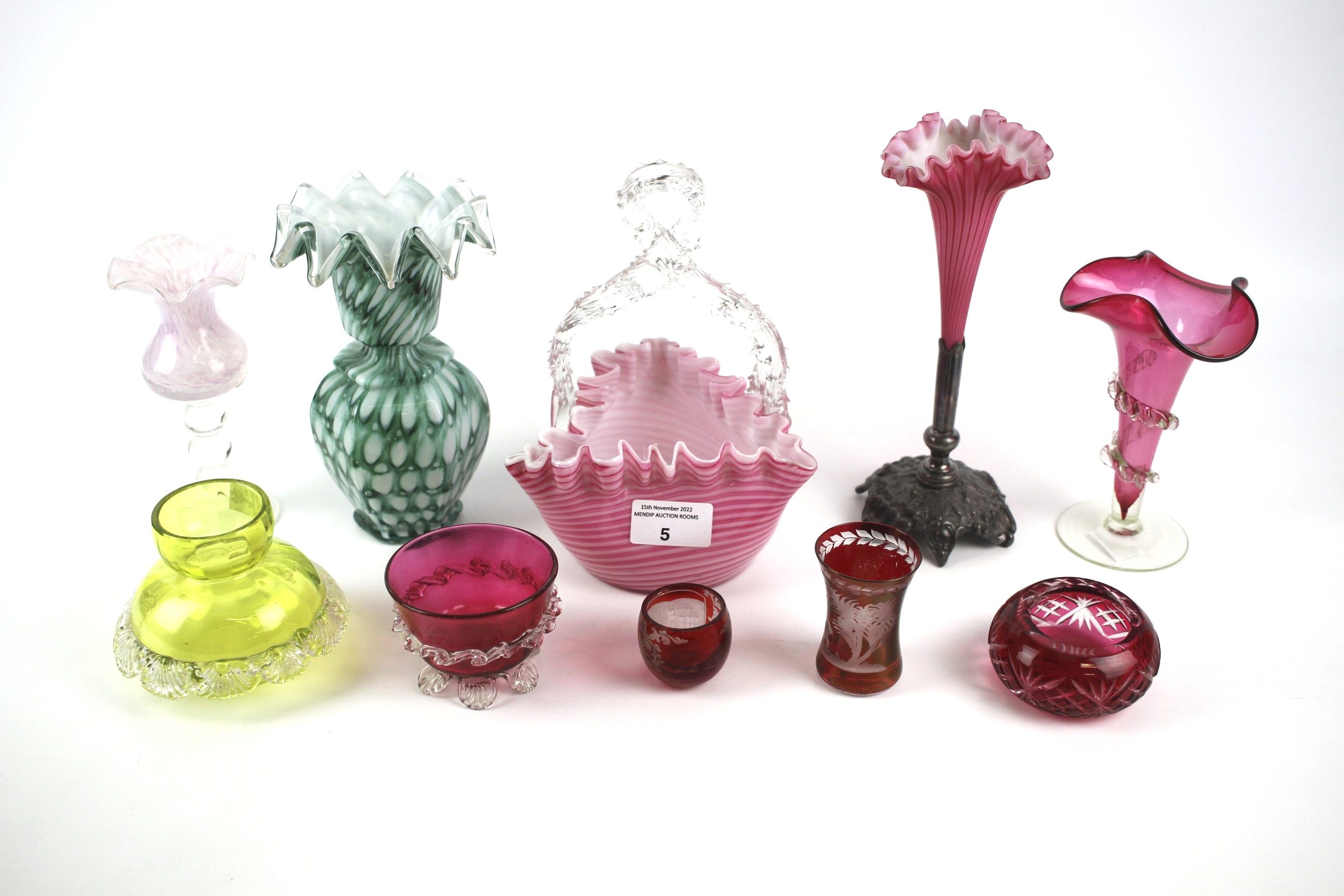 An assortment of 20th century coloured glassware.
