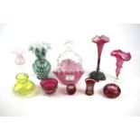 An assortment of 20th century coloured glassware.