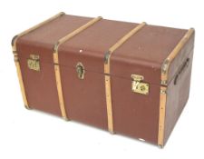 A 20th century hessian covered trunk.