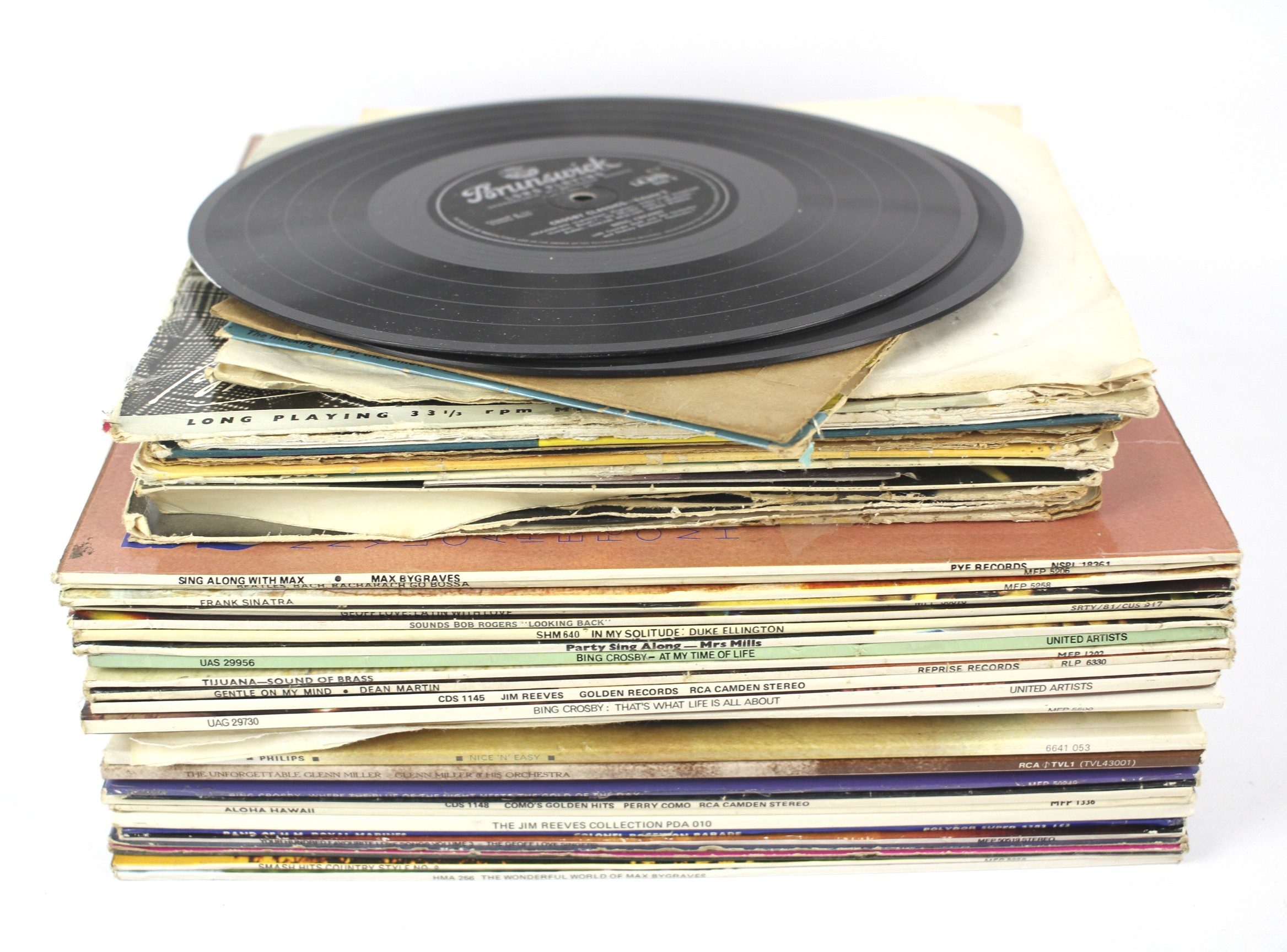 A collection of cased vinyl records.