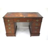 A 20th century mahogany twin pedestal writing desk.