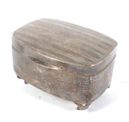 A silver ring box.