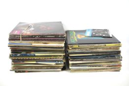 An assortment of vinyl LP records.