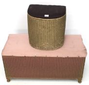 A 20th century Lloyd Loom blanket box and a laundry basket.