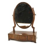 An early 19th century mahogany dressing table mirror.