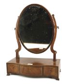 An early 19th century mahogany dressing table mirror.
