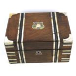 A Victorian rosewood and mother of pearl inlaid box.