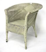 A Lloyd Loom chair.