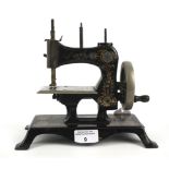 An early 20th century German Castige child's sewing machine.