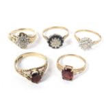 Five gold and yellow metal dress rings. Each set with semi-precious stones, weight 14.
