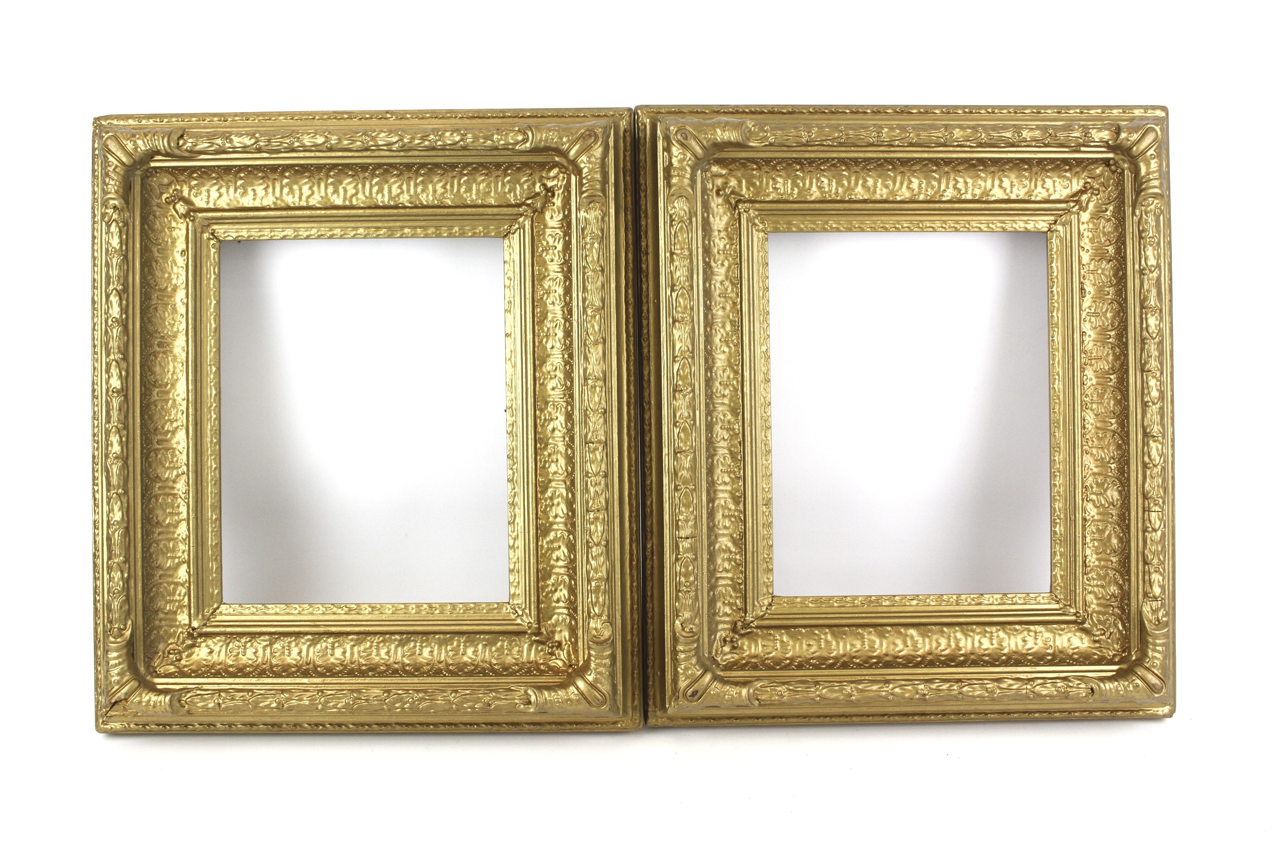 Two ornate giltwood picture frames.