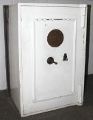 A Victorian floor standing white painted safe by J Cartwright & Sons.