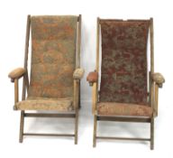 Two early 20th century upholstered folding steamer chairs.
