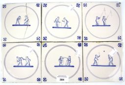 Six Dutch Delft blue and white tiles.