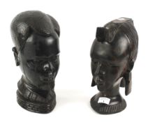 Two African solid wood busts.