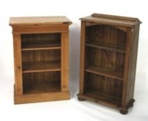 Two contemporary pine book shelves.