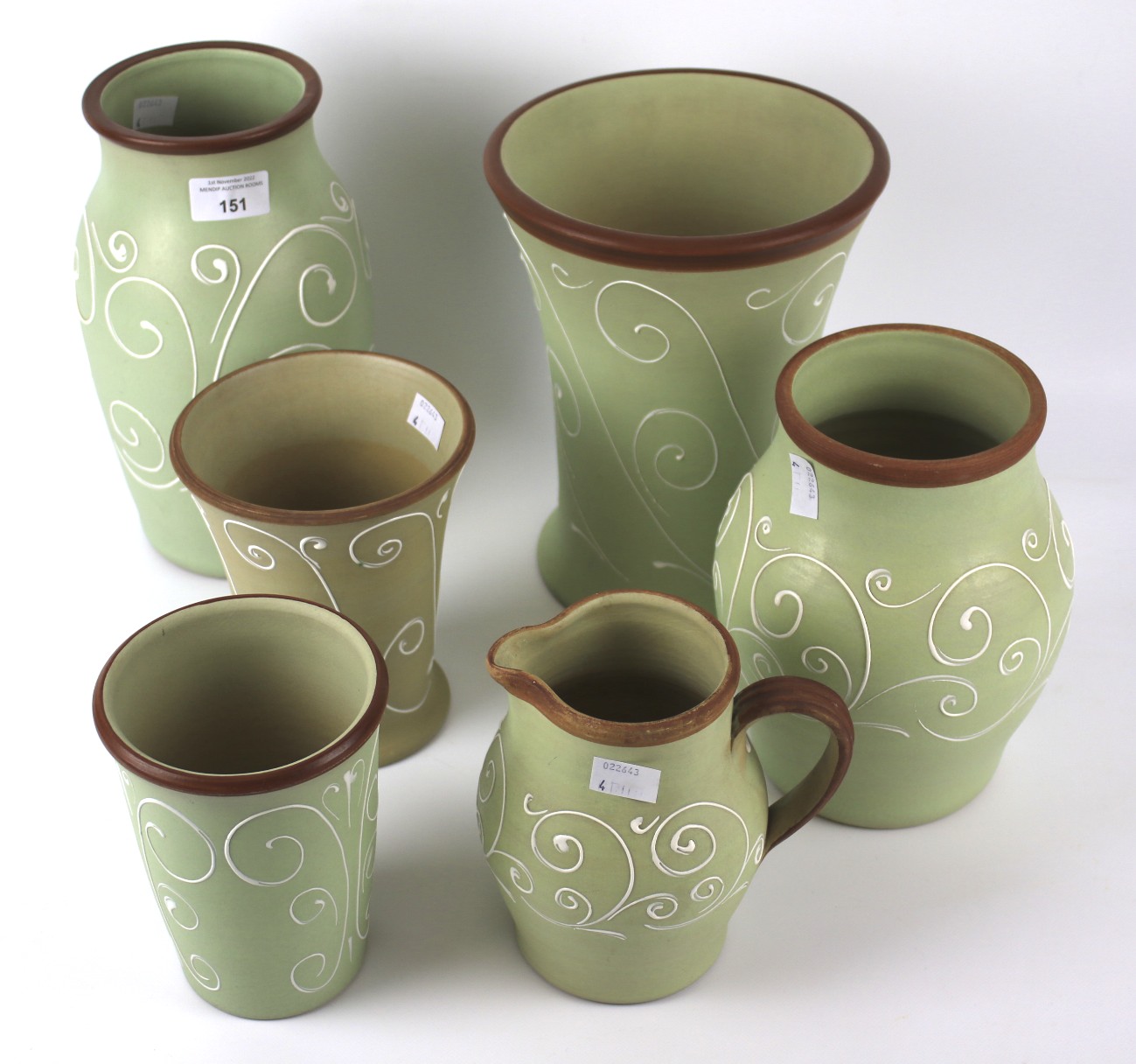 A collection of six Denby Ferndale pattern stoneware vases and a jug.