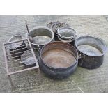 An assortment of galvanised pots.