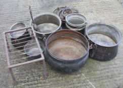 An assortment of galvanised pots.