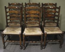 A set of six wooden chairs.
