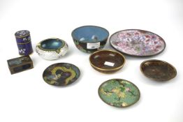 An assortment of Asian cloisonne enamel items.
