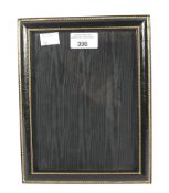A mid-century leather mounted photo frame by Asprey.