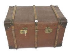 A 20th century hessian covered trunk.