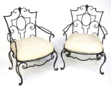 A pair of garden chairs.