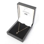 A 9ct gold and diamond pendant. Attached on a matching chain, weight 3.