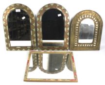 Four contemporary wall mirrors.